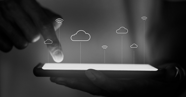 cloud icons above a phone representing the benefits of the hybrid cloud for small businesses