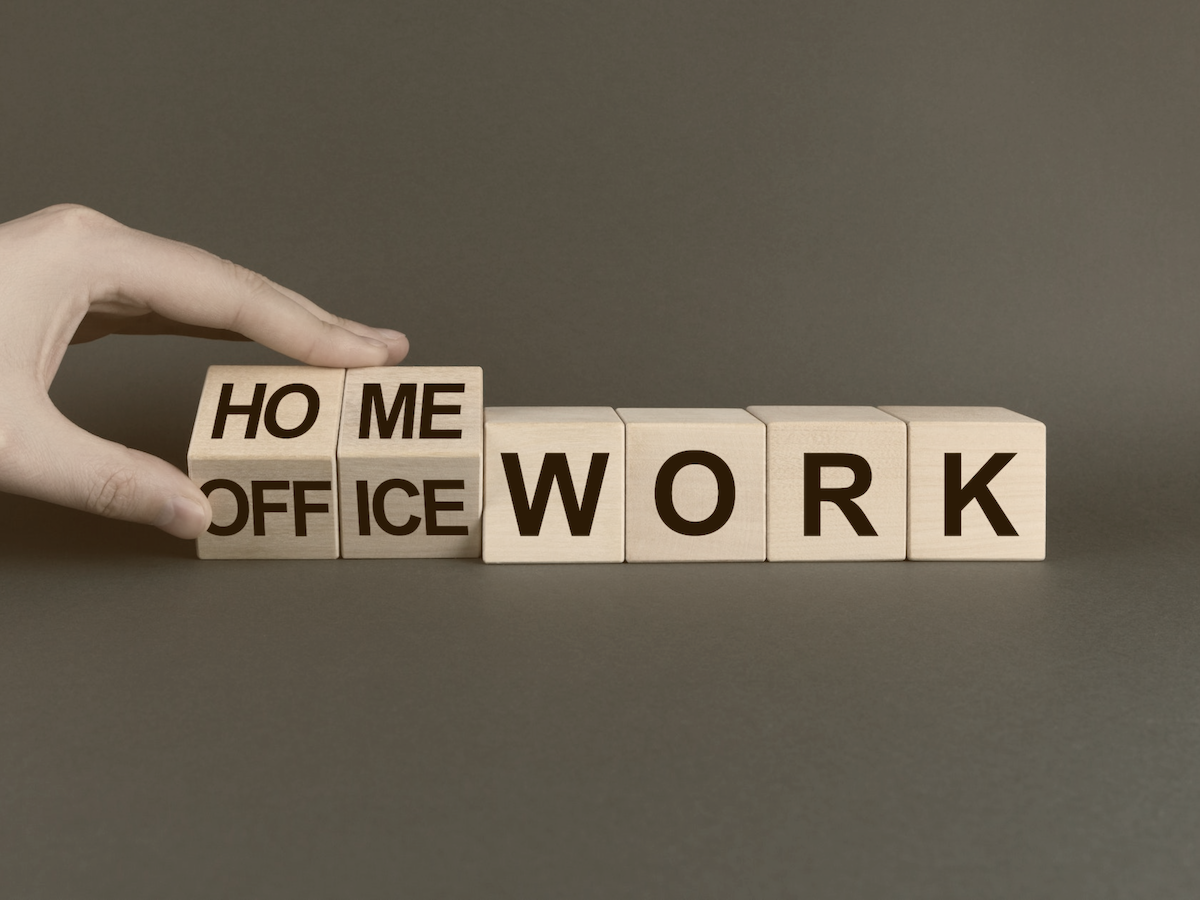 Wooden blocks spelling out home or office work