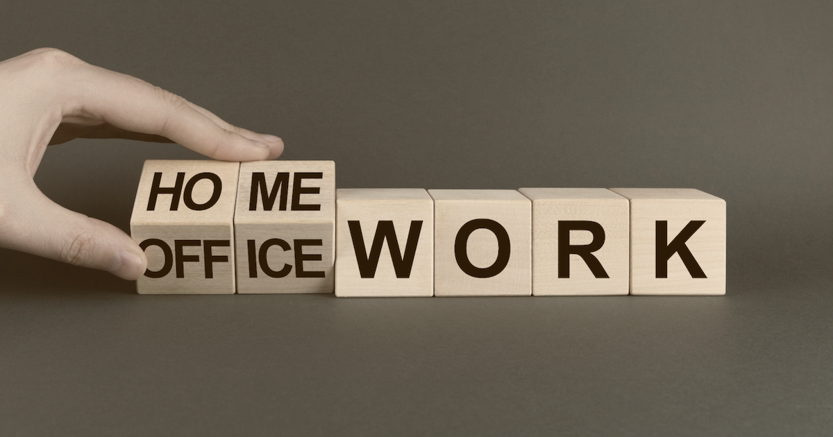 Wooden blocks spelling out home or office work
