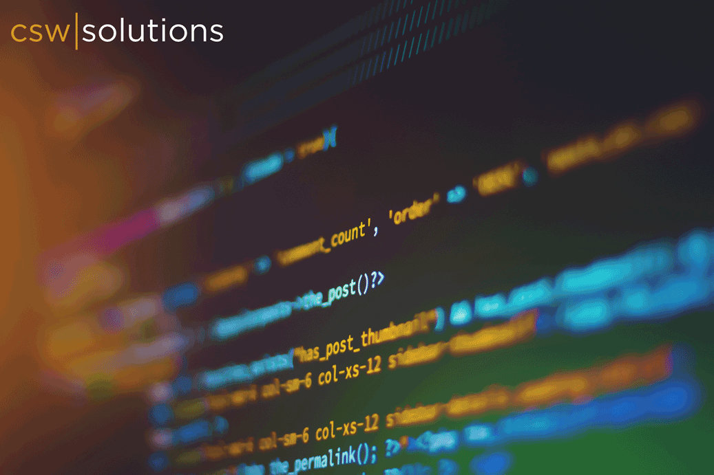 Code on dark computer screen with CSW logo