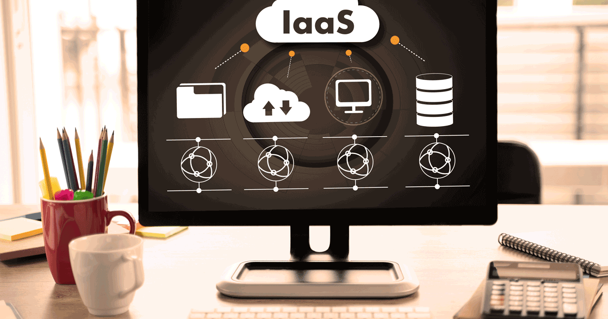 Desk with computer screen showing visualization of IaaS