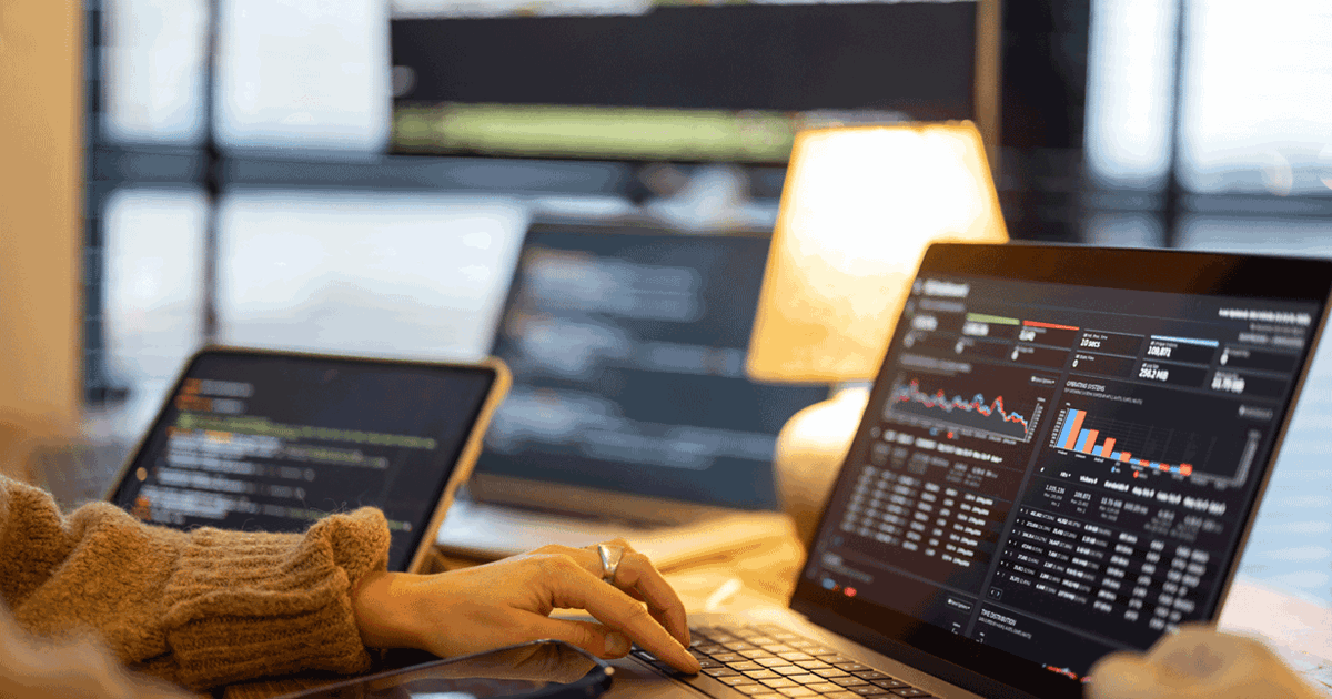 Business person reviewing data in cloud scale analytics