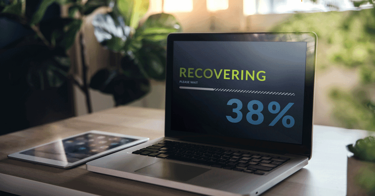 Laptop on desk with recovery percentage BCDR